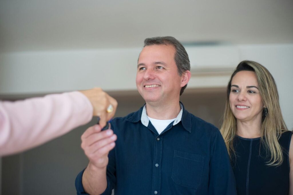 Foreigners receiving keys to their new property